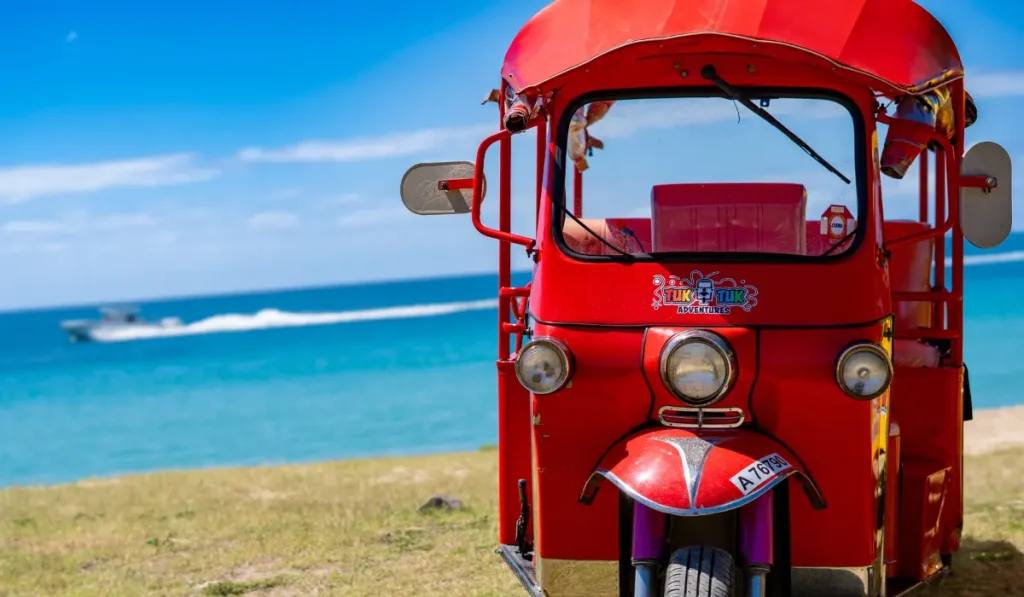 red tuktuk rockadventuresantigua brewery tour